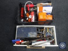 A wooden drawer and a crate of assorted hand and power tools