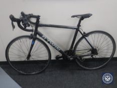 A Btwin Triban 500 road bike