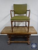 An oak refectory coffee table and an oak armchair