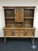 A Victorian oak kitchen dresser