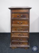 A shaped Indonesian six drawer chest CONDITION REPORT: 103cm high by 53cm wide by