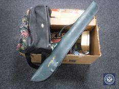 A box of Riley snooker cue in case, lawn bowls, board games,