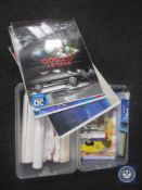 Two boxes containing 3D posters, stickers,