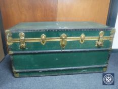 An early 20th century metal bound travelling trunk