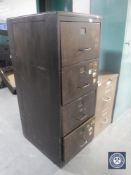 An early 20th century wooden four drawer filing cabinet