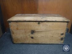 An antique pine blanket box