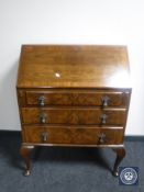 A 20th century walnut bureau