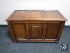 An oak linen fold bedding box