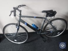 A gent's Apollo Transfer hybrid bike