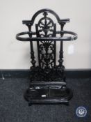 A cast iron stick stand