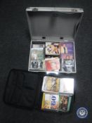 A bag and aluminium case containing CD's - Elvis Presley,