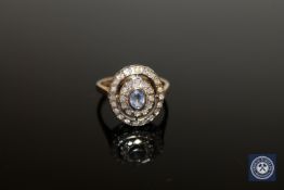 A 9ct gold sapphire and diamond cluster ring,