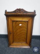 A Victorian walnut wall cabinet