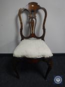 A 19th century Dutch mahogany chair with marquetry inlay