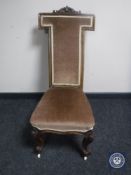 A Victorian mahogany nursing chair