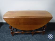 A mahogany drop leaf coffee table