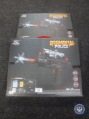 Two boxed Regimental Police mini uzi electric guns