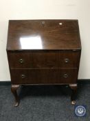 A 20th century walnut writing bureau