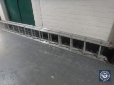 An aluminium extension ladder