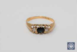 An 18ct gold sapphire and diamond ring,