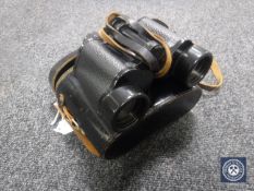 A set of leather cased Russian field glasses 12X40