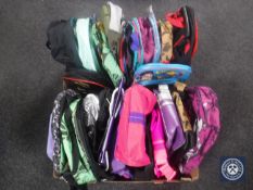 Two boxes containing a large quantity of assorted hold alls