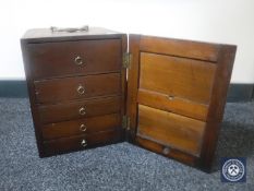 An Edwardian mahogany desk top cabinet