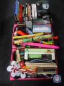 Three boxes containing assorted books, DVD's, TV,