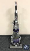 A Dyson DC25 upright vacuum cleaner