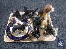 A tray of dog ornaments, decorative plate, Royal Doulton Setter, labrador book ends etc.