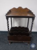 An early 20th century oak magazine table