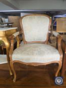 A continental carved beech framed salon armchair