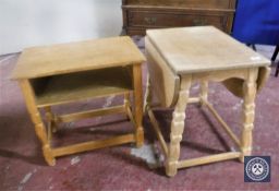 A blonde oak drop leaf table and a blonde oak side table