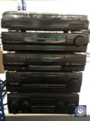 A Kenwood five piece stereo system CONDITION REPORT: No remote.