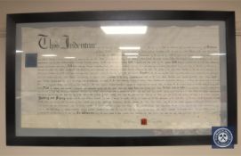 A framed 19th century indenture