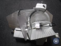 A commercial meat slicer