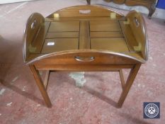 A mahogany butler's tray on stand