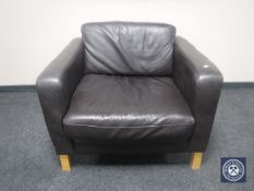 A brown leather armchair