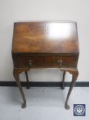 A walnut Queen Anne style writing bureau