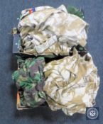 Two boxes containing a large quantity of DPM military clothing
