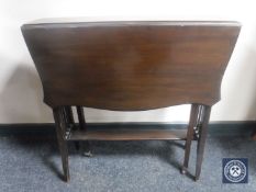 A Victorian mahogany drop leaf Sutherland table