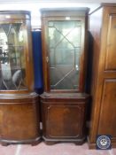 A mahogany corner cabinet