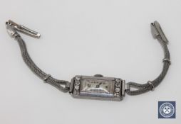 A lady's platinum diamond set cocktail watch CONDITION REPORT: Fully wound and not