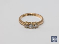 A Victorian 18ct gold diamond three stone ring.