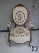 A continental carved walnut salon armchair