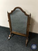 A Victorian walnut dressing table mirror
