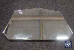 An early twentieth century frameless mirror