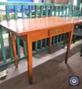 A stained pine writing desk fitted a drawer and a mahogany single chair