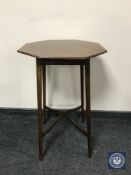 An Edwardian mahogany octagonal occasional table