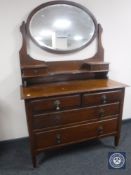 An Edwardian mahogany dressing chest